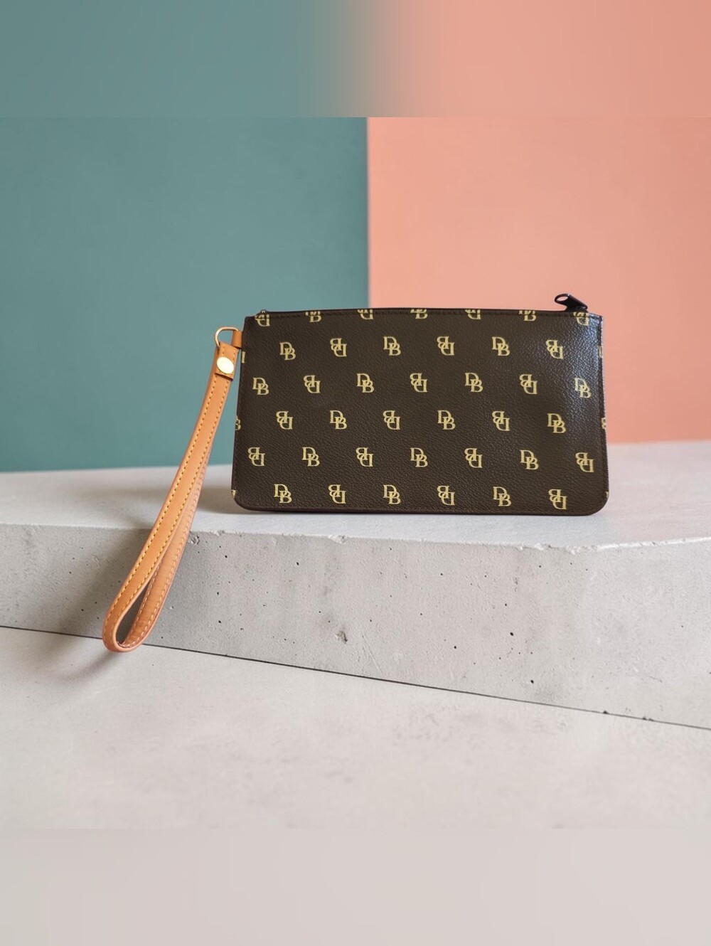 Dooney & Bourke Brown Monogram Wristlet with Tan Strap